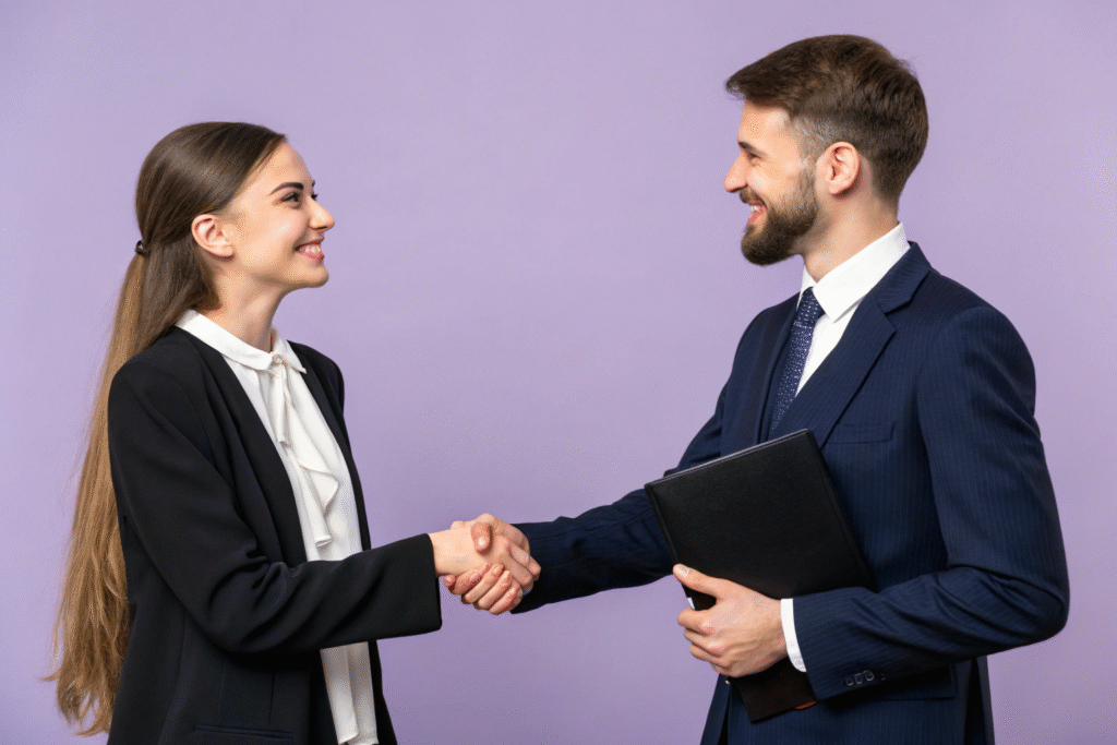 beautiful lawyer woman shaking hands with a busine